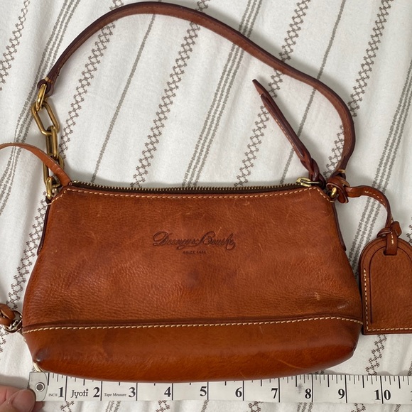 Dooney & Bourke Handbags - Dooney & Bourke small leather clutch handbag